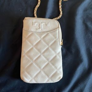 Tory Burch light blue crossbody. Three card slots inside.